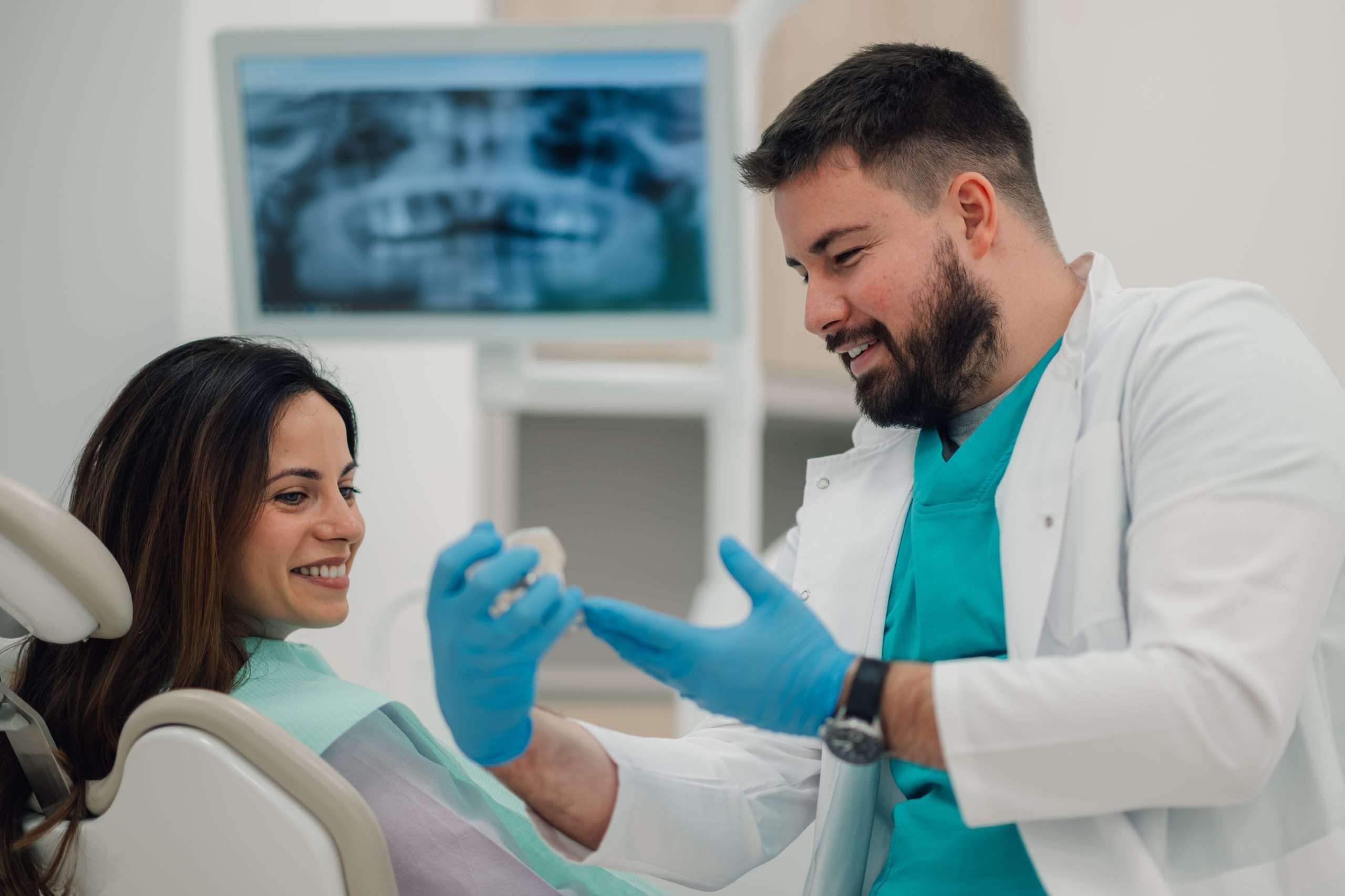 dentist talking to patient